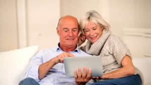 stock-footage-senior-couple-surfing-on-internet-with-touchpad